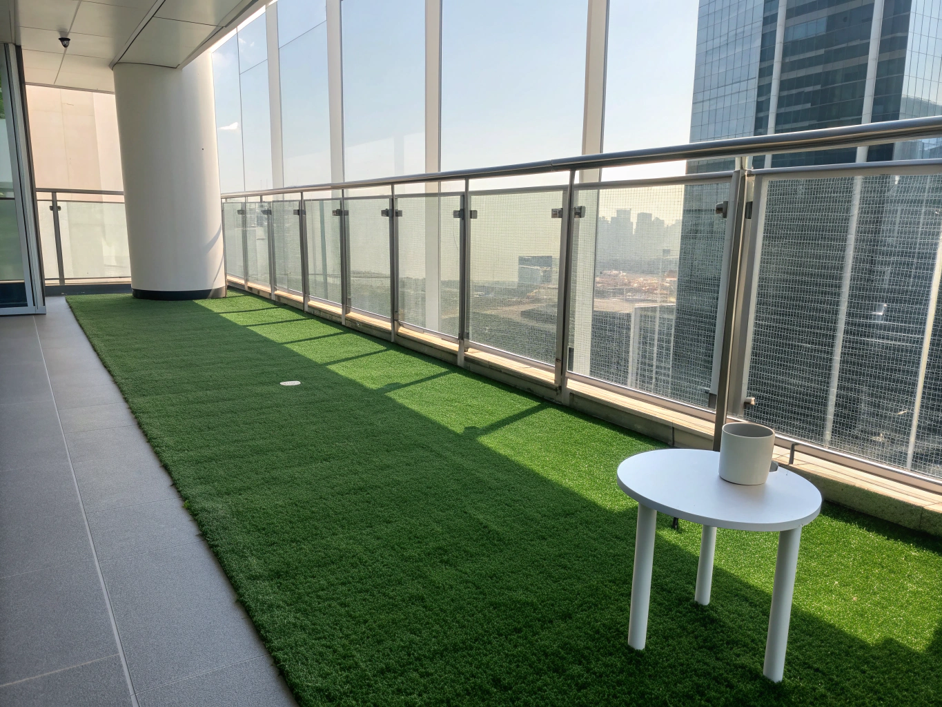 Apartment balcony terrace transformed with precision-cut artificial grass