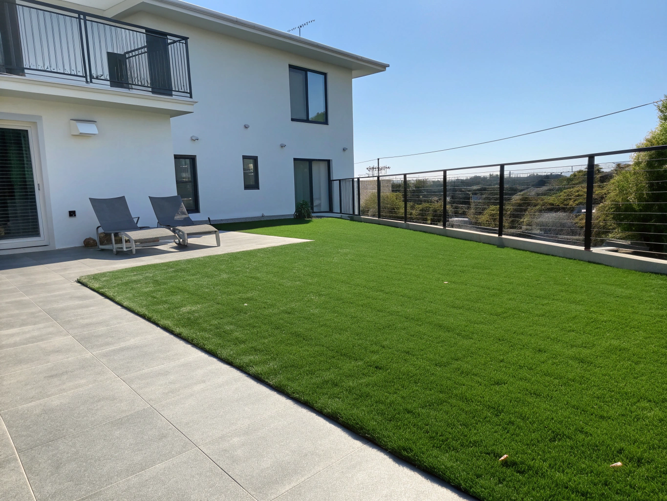 Full front yard synthetic turf conversion in Plano, Texas
