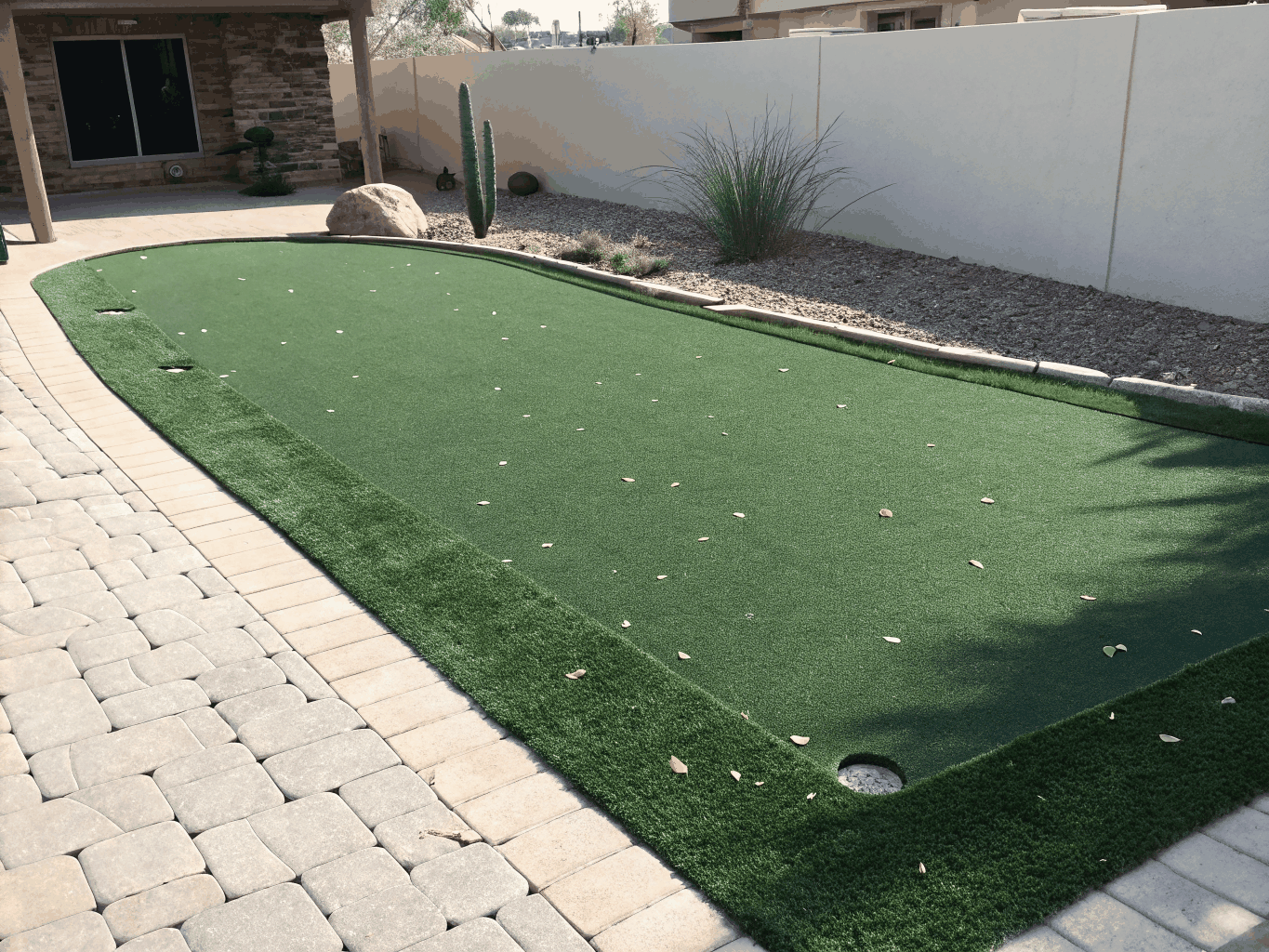 Compact Patio Putting Strip custom fitted for a residential courtyard in Murphy, TX