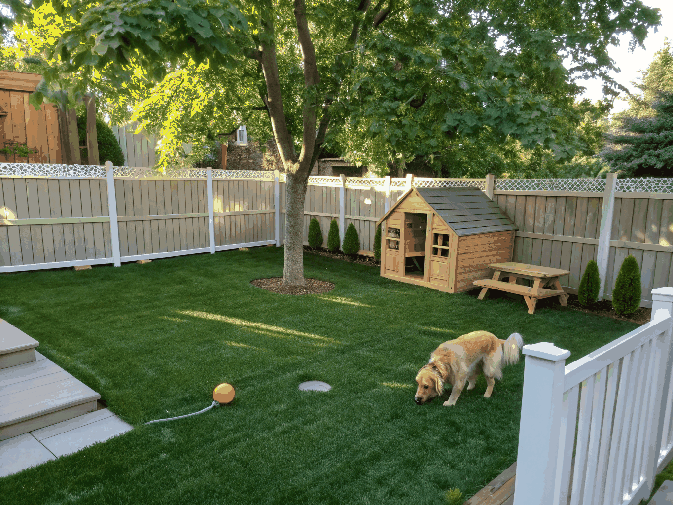 Fenced dog kennel synthetic turf installation in Allen TX